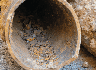 Common Causes of Sediment in Building Water Systems