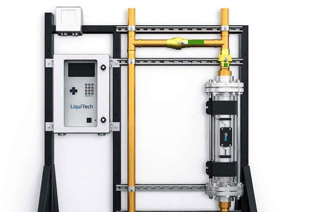 LiquiTech Copper-Silver Ionization system mounted on a wall panel, showing the control unit and pipe connections