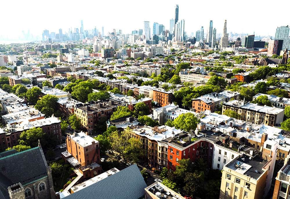 Aerial view of a dense urban residential neighborhood on the LiquiTech Multi-Family Residential page