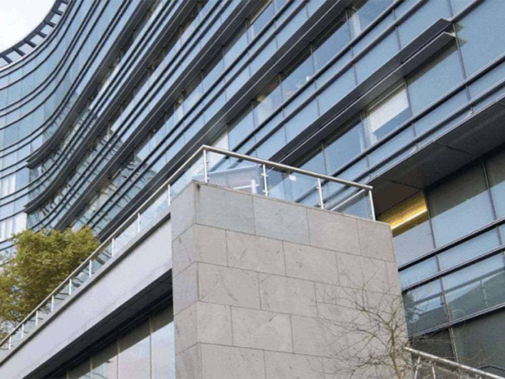 Exterior of a modern hospital building featured in a LiquiTech Sediment Filtration case study
