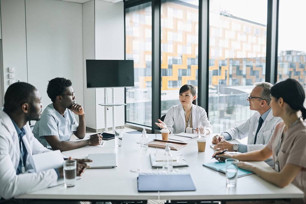 group of medics at meeting table